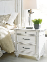J&M Furniture - Ashley Furniture - Kanwyn Nightstand - Three Drawer Night Stand / Whitewash - B777-93