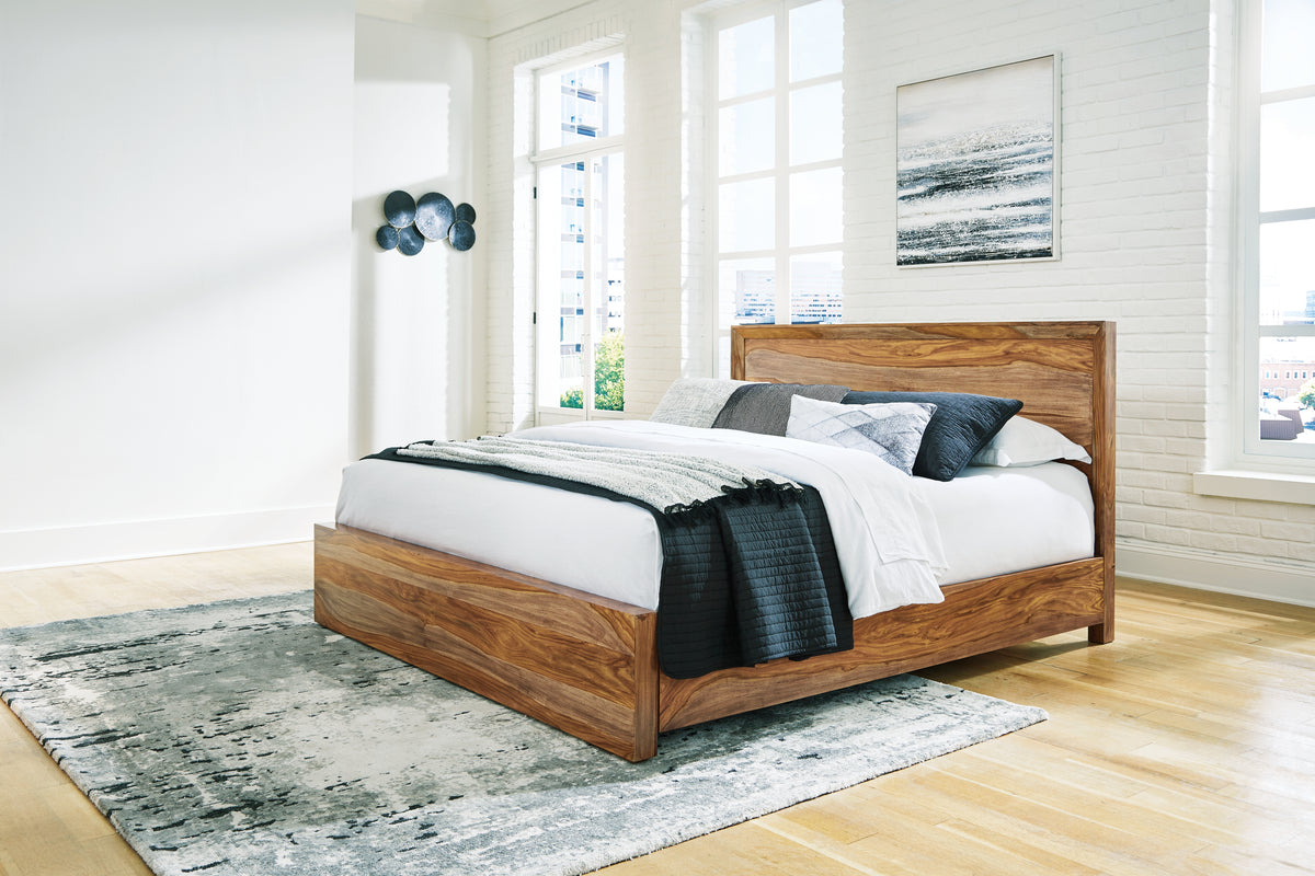 J&M Furniture - Ashley Furniture - Dressonni Queen Panel Bed - Queen Panel Bed / Brown - B790B2