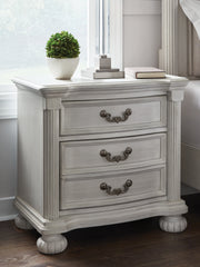 J&M Furniture - Ashley Furniture - Montelaine Nightstand - Three Drawer Night Stand / Antique White - B795-93