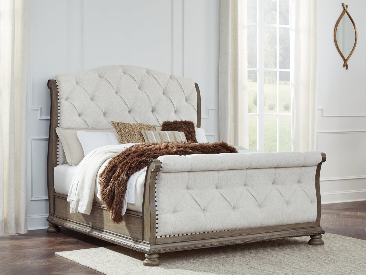 J&M Furniture - Ashley Furniture - Ardenfield Queen Upholstered Sleigh Bed - Queen Upholstered Sleigh Bed / Light Brown - B944B2