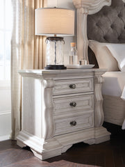 J&M Furniture - Ashley Furniture - Bruchandi Nightstand - Three Drawer Night Stand / Antique White - PCB948-93