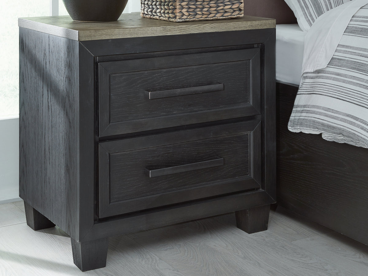 J&M Furniture - Ashley Furniture - Foyland Nightstand - Two Drawer Night Stand / Black/Brown - B989-92