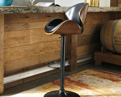 J&M Furniture - Ashley Furniture - Bellatier Adjustable Height Bar Stool - Tall UPH Swivel Barstool(1/CN) / Brown - D120-530