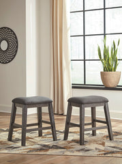 J&M Furniture - Ashley Furniture - Caitbrook Counter Height Upholstered Bar Stool (Set of 2) - Counter Height Upholstered Bar Stool (Set of 2) / Gray - D388-024X2