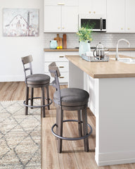 J&M Furniture - Ashley Furniture - Caitbrook Counter Height Bar Stool - UPH Swivel Barstool (1/CN) / Gray - D388-224