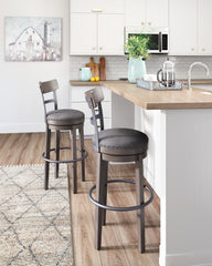J&M Furniture - Ashley Furniture - Caitbrook Bar Height Bar Stool - Tall UPH Swivel Barstool(1/CN) / Gray - D388-230
