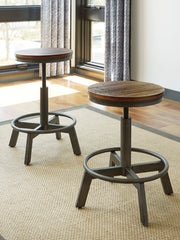 J&M Furniture - Ashley Furniture - Torjin Counter Height Stool (Set of 2) - Counter Height Stool (Set of 2) / Brown/Gray - D440-024X2