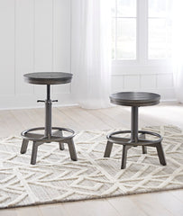 J&M Furniture - Ashley Furniture - Torjin Counter Height Stool (Set of 2) - Counter Height Stool (Set of 2) / Gray - D440-324X2