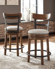 J&M Furniture - Ashley Furniture - Valebeck Counter Height Bar Stool - UPH Swivel Barstool (1/CN) / Black - D546-624