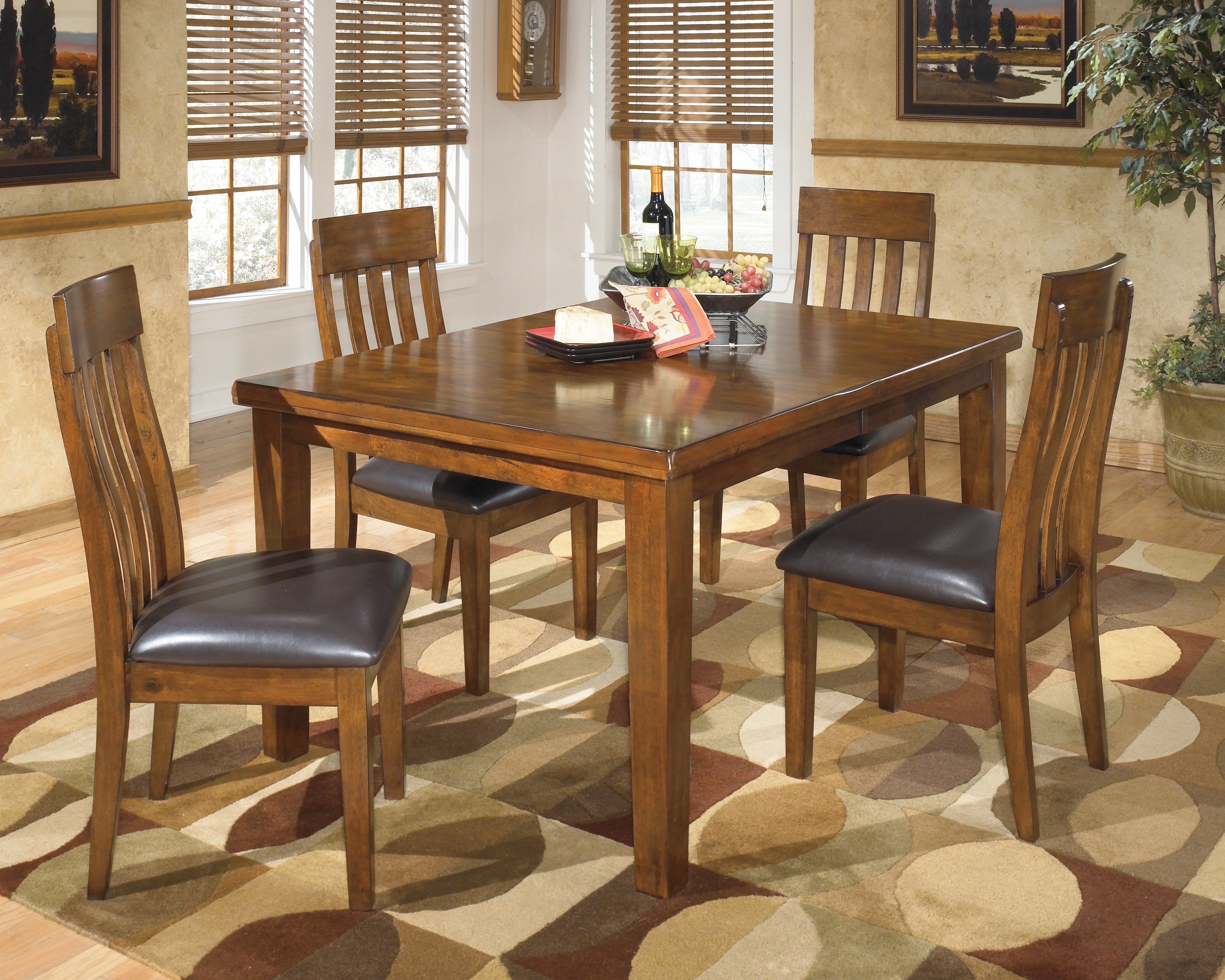 J&M Furniture - Ashley Furniture - Ralene Dining Table with 4 Chairs - Dining Table with 4 Chairs / Medium Brown - D594D6
