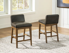 J&M Furniture - Ashley Furniture - Cabalynn Counter Height Barstool (Set of 2) - Counter Height Barstool (Set of 2) / Light Brown - D974-124X2