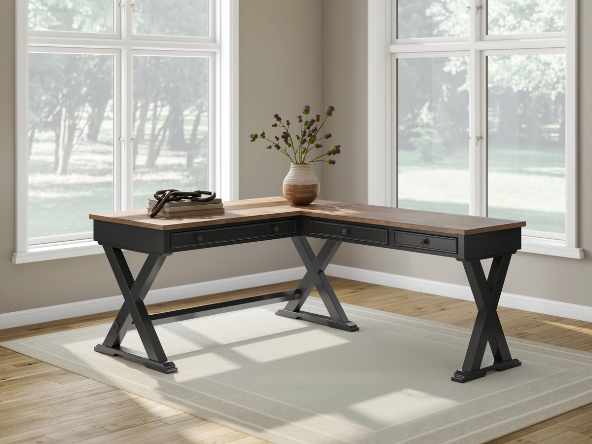 J&M Furniture - Ashley Furniture - Wildenauer Home Office Desk - Home Office Desk / Brown/Black - H664H2