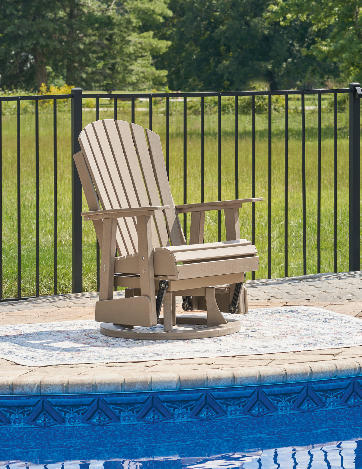 J&M Furniture - Ashley Furniture - Hyland Wave Outdoor Swivel Glider Chair - Swivel Glider Chair / Driftwood - P114-820