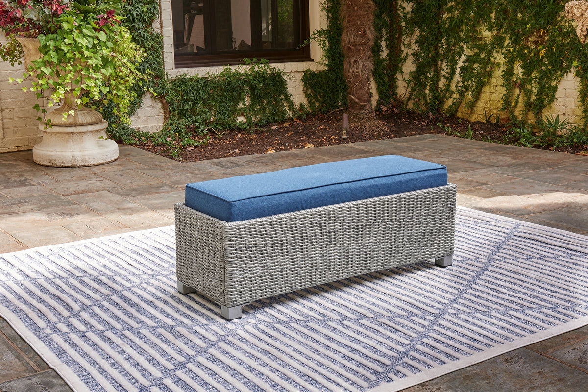 J&M Furniture - Ashley Furniture - Naples Beach Outdoor Bench with Cushion - Bench with Cushion / Light Gray - P439-600