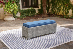 J&M Furniture - Ashley Furniture - Naples Beach Outdoor Bench with Cushion - Bench with Cushion / Light Gray - P439-600
