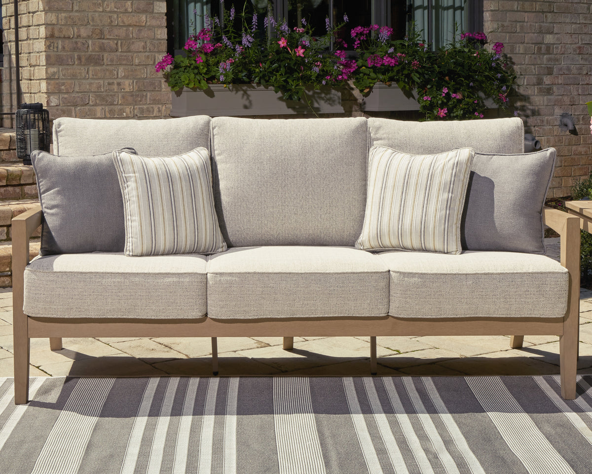 J&M Furniture - Ashley Furniture - Hallow Creek Outdoor Sofa with Cushion - Sofa with Cushion / Driftwood - P560-838