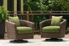 J&M Furniture - Ashley Furniture - Horizon Hall Outdoor Swivel Lounge Chair with Cushion - Swivel Lounge w/ Cushion / Brown/Green - P572-821