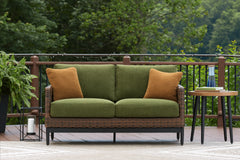 J&M Furniture - Ashley Furniture - Horizon Hall Outdoor Loveseat with Cushion - Loveseat w/Cushion / Brown/Green - P572-835