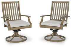 J&M Furniture - Ashley Furniture - Rainier Ranch Outdoor Swivel Chair with Cushion (Set of 2) - Swivel Chair w/Cushion (Set of 2) / Brown/Beige - P701-602A
