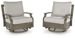 J&M Furniture - Ashley Furniture - Rainier Ranch Outdoor Swivel Glider Chair with Cushion - Swivel Glider Chair w/Cushion / Brown/Beige - P701-821