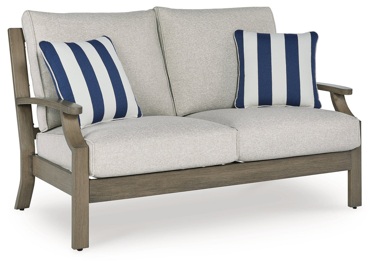 J&M Furniture - Ashley Furniture - Rainier Ranch Outdoor Loveseat with Cushion - Loveseat w/Cushion / Brown/Beige - P701-835