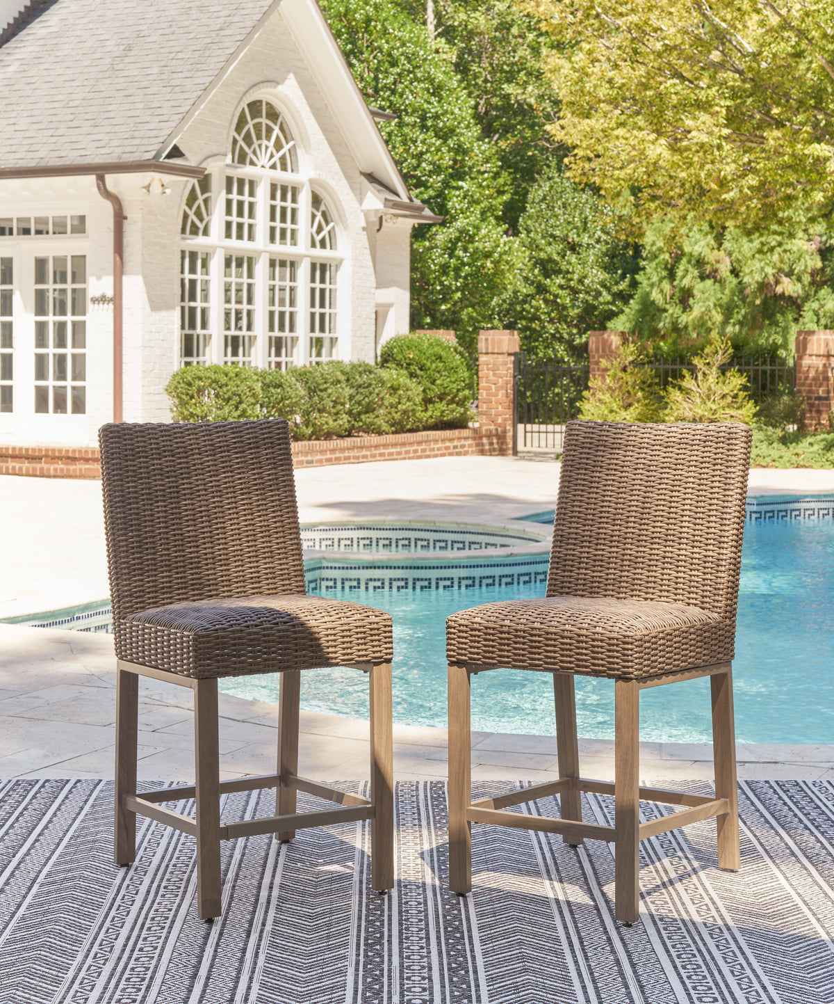 J&M Furniture - Ashley Furniture - Walton Bridge Outdoor Bar Stool (Set of 2) - Barstool (Set of 2) / Driftwood - P749-130