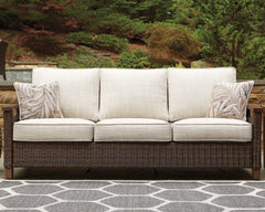 J&M Furniture - Ashley Furniture - Paradise Trail Sofa with Cushion - Sofa with Cushion / Medium Brown - P750-838