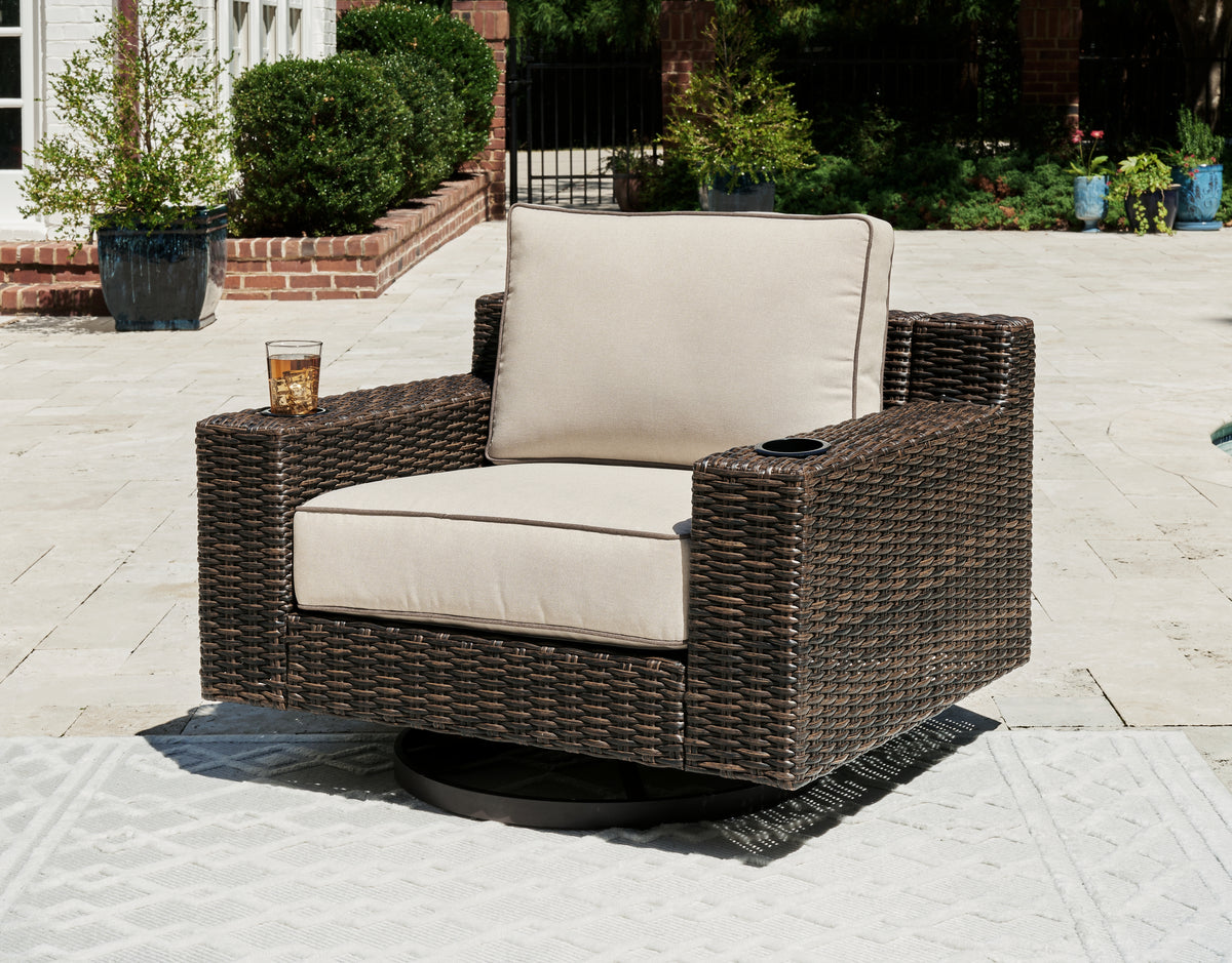 J&M Furniture - Ashley Furniture - Coastline Bay Outdoor Swivel Lounge with Cushion - Swivel Lounge w/ Cushion / Brown - P784-821