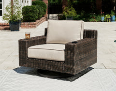 J&M Furniture - Ashley Furniture - Coastline Bay Outdoor Swivel Lounge with Cushion - Swivel Lounge w/ Cushion / Brown - P784-821