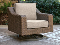 J&M Furniture - Ashley Furniture - Laguna Heights Swivel Lounge with Cushion - Swivel Lounge w/ Cushion - PCP790-821