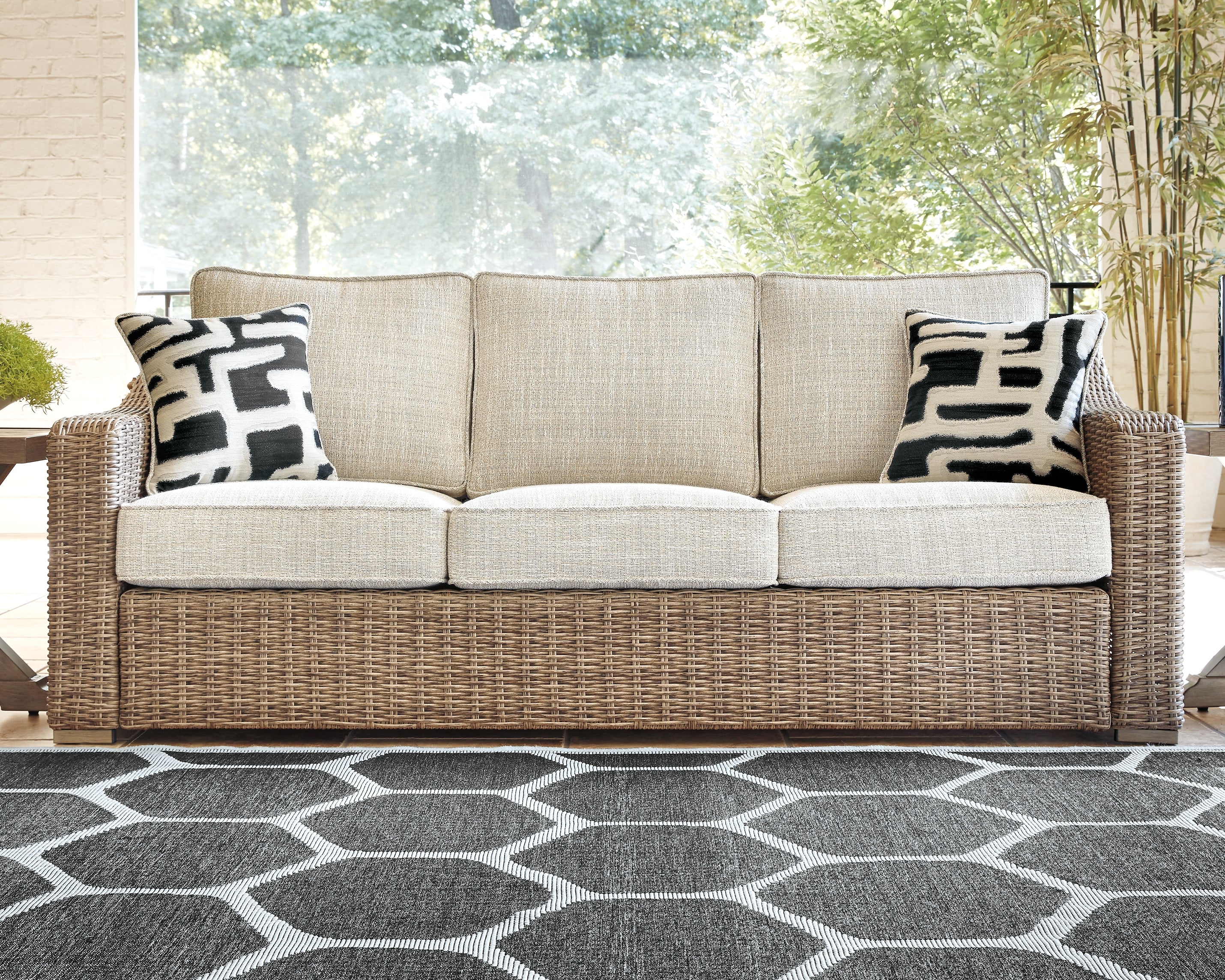 J&M Furniture - Ashley Furniture - Beachcroft Outdoor Sofa with Cushion - Sofa with Cushion / Black/Light Gray - P792-838