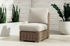 J&M Furniture - Ashley Furniture - Beachcroft Outdoor Armless Chair with Cushion - Armless Chair w/Cushion / Beige - P791-846