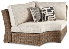 J&M Furniture - Ashley Furniture - Beachcroft Outdoor Curved Corner Chair with Cushion - Curved Corner Chair w/Cushion / Beige - P791-851
