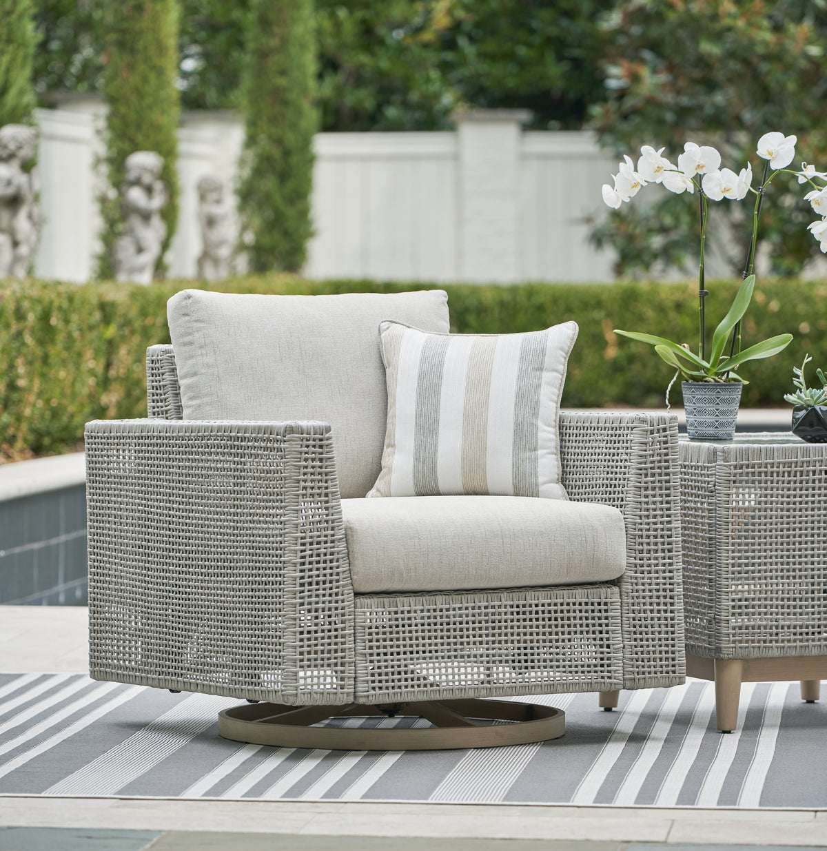 J&M Furniture - Ashley Furniture - Seton Creek Outdoor Swivel Lounge with Cushion - Swivel Lounge w/ Cushion / Gray - P798-821