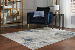 J&M Furniture - Ashley Furniture - Wrenstow 5'3" x 7'3" Rug - 5'3" x 7'3" Rug / Multi - R403752