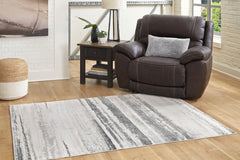 J&M Furniture - Ashley Furniture - Abanett 5'3" x 7'3" Rug - 5'3" x 7'3" Rug / Multi - R403782