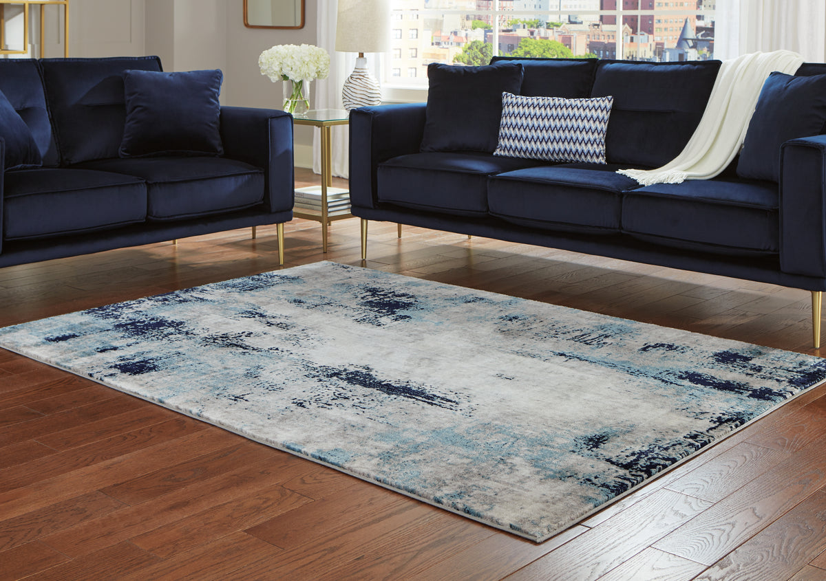 J&M Furniture - Ashley Furniture - Leonelle 5'3" x 7'3" Rug - 5'3" x 7'3" Rug / Cream/Blue/Gray - R404872