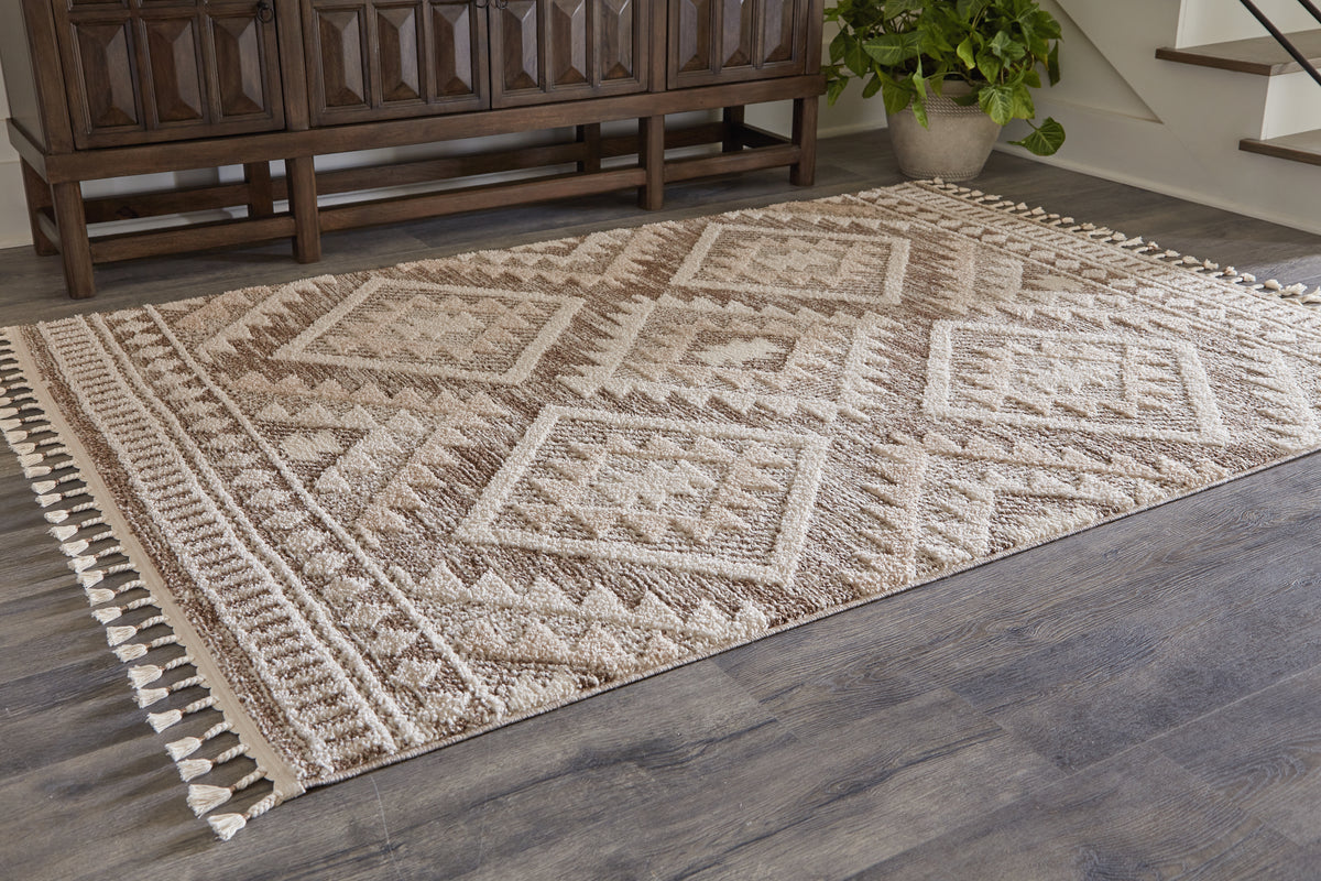 J&M Furniture - Ashley Furniture - Odedale 8' x 10' Rug - 8' x 10' Rug / Tan/Cream - R406061