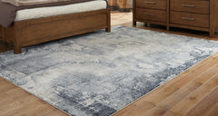 J&M Furniture - Ashley Furniture - Langrich 5'3" x 7'3" Rug - 5'3" x 7'3" Rug / Blue/Gray/Cream - R406132