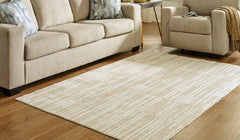 J&M Furniture - Ashley Furniture - Ardenville 5' x 7'1" Washable Rug - 5' x 7'1" Washable Rug / Tan/Cream - R406212