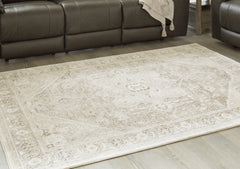 J&M Furniture - Ashley Furniture - Gatwell 5' x 7' Rug - 5' x 7' Rug / Ivory/Gray/Tan - R406512