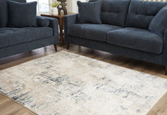 J&M Furniture - Ashley Furniture - Gentor 5' x 7' Rug - 5' x 7' Rug / Blue/Ivory - R406522