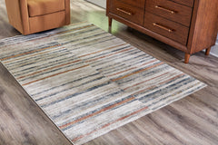 J&M Furniture - Ashley Furniture - Kemart 8' x 10' Rug - 8' x 10' Rug / Multi - R406681