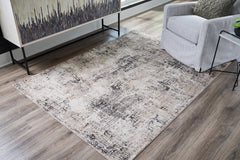 J&M Furniture - Ashley Furniture - Elaning 5' x 7' Rug - 5' x 7' Rug / Black/Gray/Cream - R406702