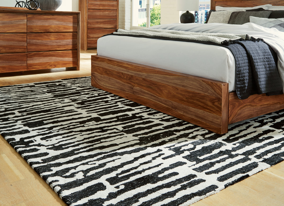 J&M Furniture - Ashley Furniture - Bramshaw 8' x 10' Rug - 8' x 10' Rug / Black/Ivory - R406761