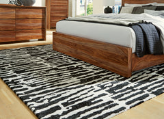J&M Furniture - Ashley Furniture - Bramshaw 8' x 10' Rug - 8' x 10' Rug / Black/Ivory - R406761