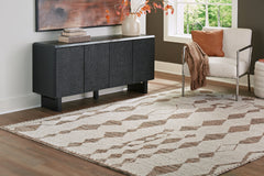 J&M Furniture - Ashley Furniture - Brettler 8' x 10' Rug - 8' x 10' Rug / Beige/Brown - R406791