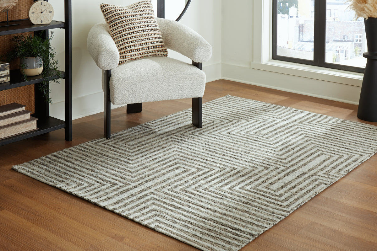 J&M Furniture - Ashley Furniture - Jossen 5' x 7' Rug - 5' x 7' Rug / Ivory/Gray - R406832