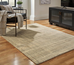 J&M Furniture - Ashley Furniture - Janston 5' x 7' Rug - 5' x 7' Rug / Ivory/Gray/Tan - R406862