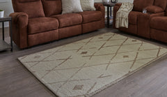 J&M Furniture - Ashley Furniture - Guyford 5' x 7' Rug - 5' x 7' Rug / Beige/Brown - R406872